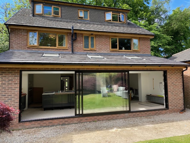 Glass sliding doors at the back of residential house